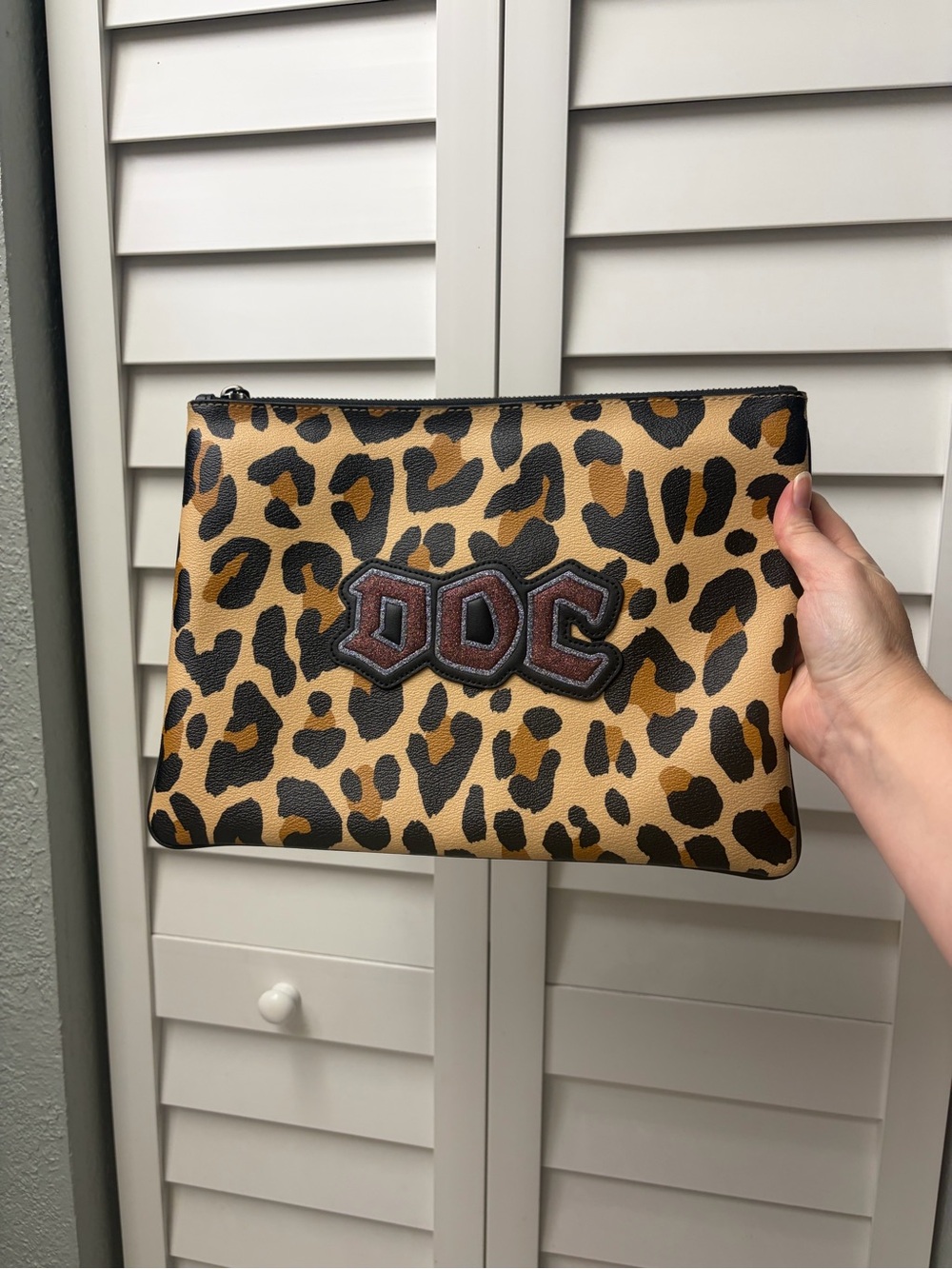 Coach Leopard Print Clutch with Brown Patch